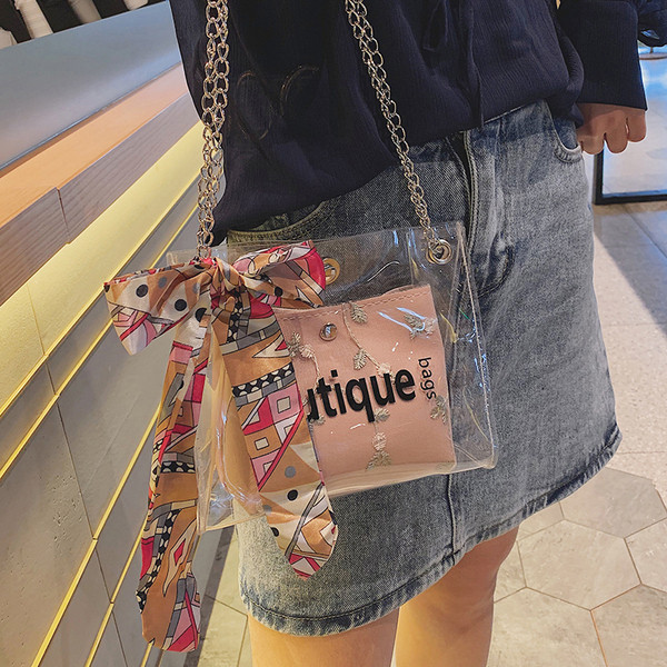 Geanta de dama moderna cu husa transparenta si broderie in patru culori