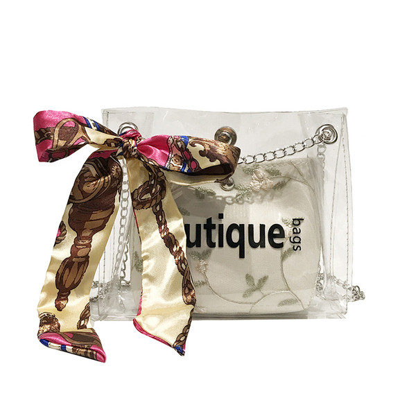 Geanta de dama moderna cu husa transparenta si broderie in patru culori