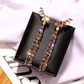 Модерни дамски обеци в златист цвят с камъни