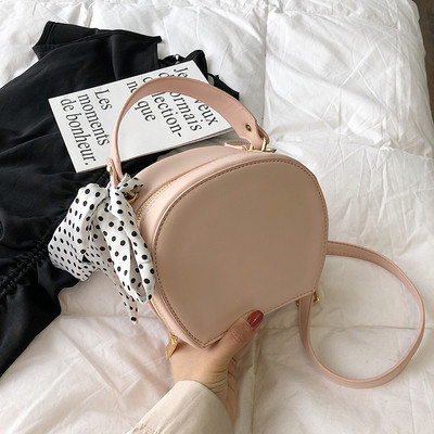 Öt színben, ökológiai bőrből készült modern női táska, hosszú füllel