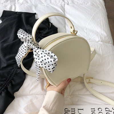 Öt színben, ökológiai bőrből készült modern női táska, hosszú füllel