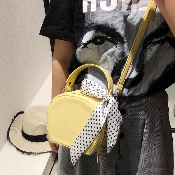 Öt színben, ökológiai bőrből készült modern női táska, hosszú füllel