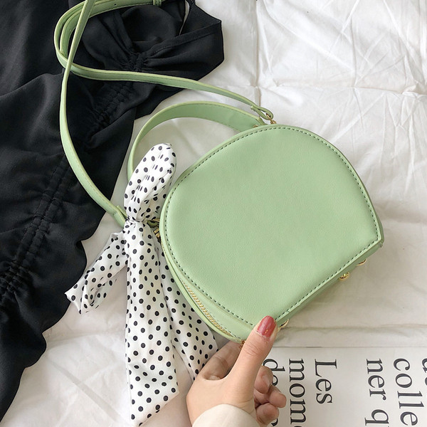 Öt színben, ökológiai bőrből készült modern női táska, hosszú füllel