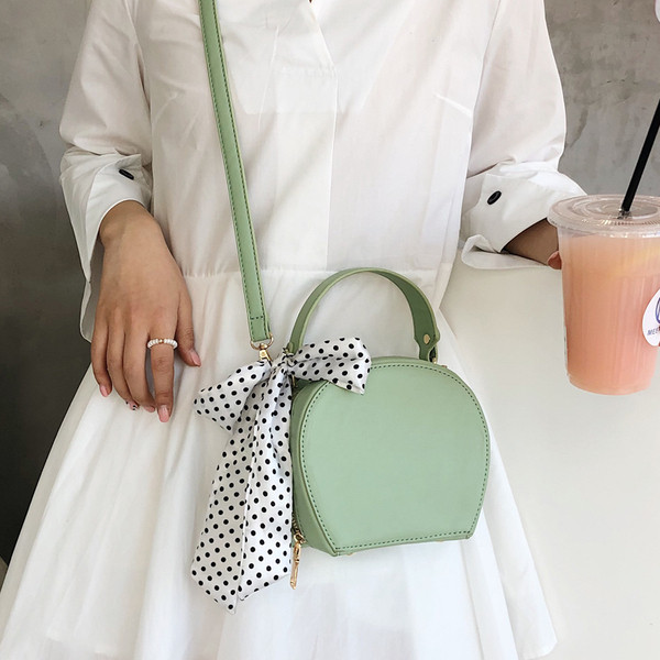 Öt színben, ökológiai bőrből készült modern női táska, hosszú füllel