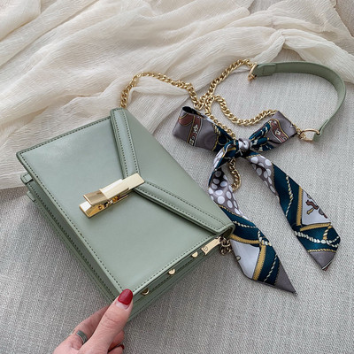 Öko bőrből készült modern női táska négy színben, fém rögzítéssel