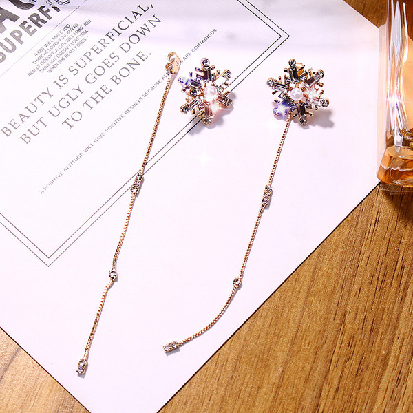 Hosszú női fülbevaló arany színű kövekkel