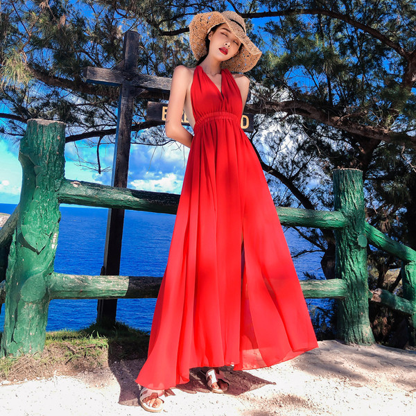 Modern hosszú női ruha csupasz háttal, piros színben