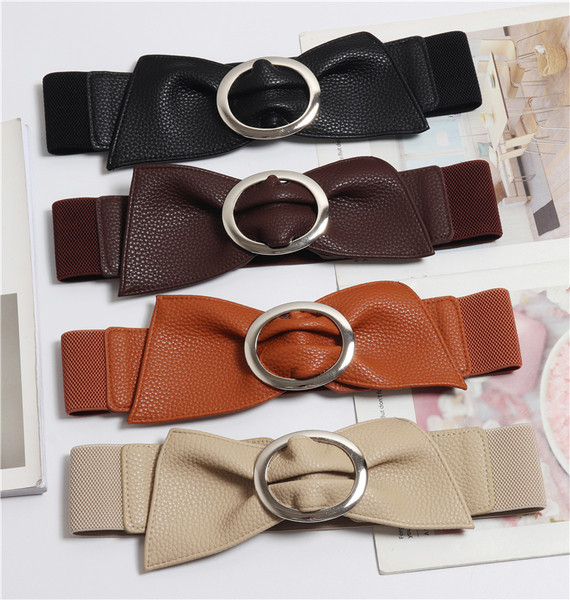 Széles női bőr öv fém csattal több színben