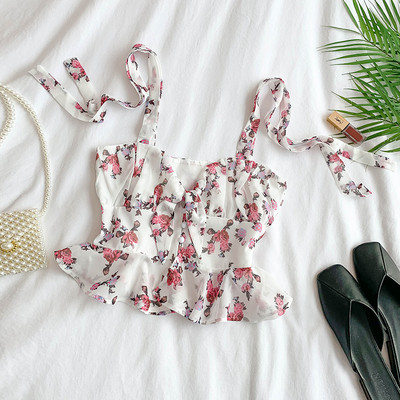 Virágmintás, pántokkal ellátott női felső több színben