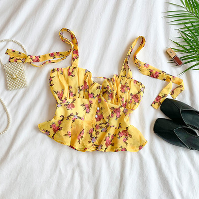 Virágmintás, pántokkal ellátott női felső több színben