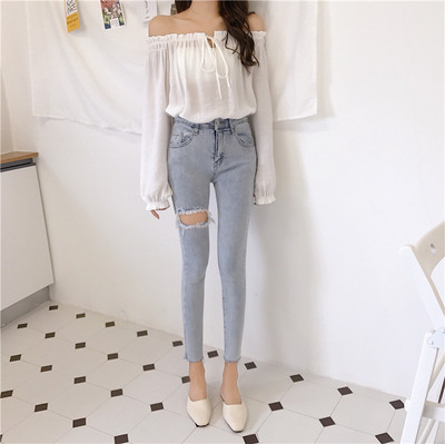 Μοντέρνα γυναικεία τζιν  με ψηλή μέση και σκισμένα σχέδια σε μπλε χρώμα