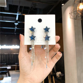 Stílusos női fülbevaló kék színben kövekkel