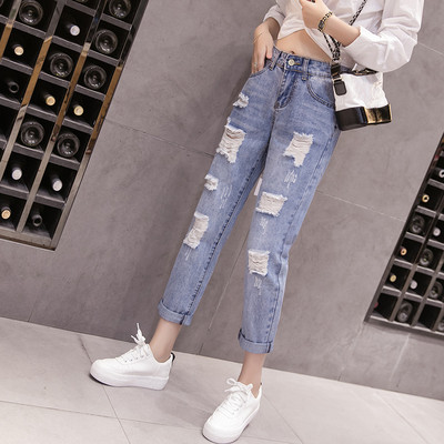 Model nou de blugi de dama cu talie inalta si motive rupte in culoare deschisa