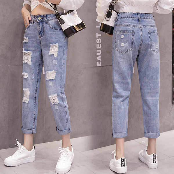 Нов модел дамски дънки с висока талия и скъсани мотиви в светъл цвят