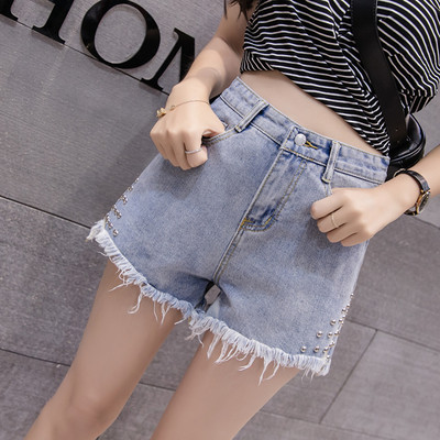 Модерни къси дънкови панталони с метални капси в син цвят