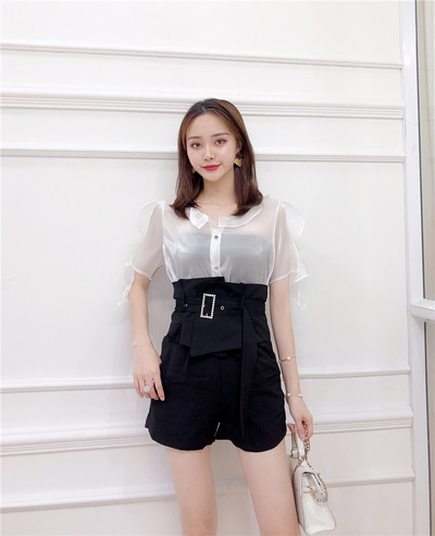 Модерен дамски панталон с висока талия и колан в черен и бял цвят