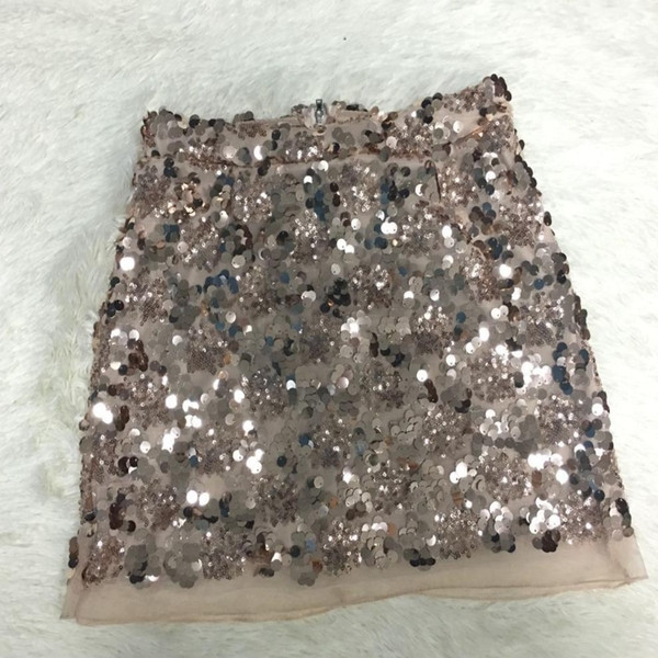Къса дамска пола с пайети в златист и сребрист цвят