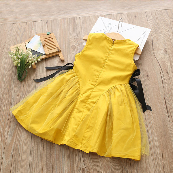 Разкроена детска рокля в жълт цвят за момичета