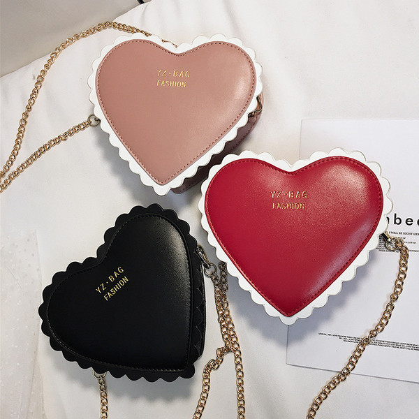 Модерна дамска чанта от еко кожа в три цвята във формата на сърце 