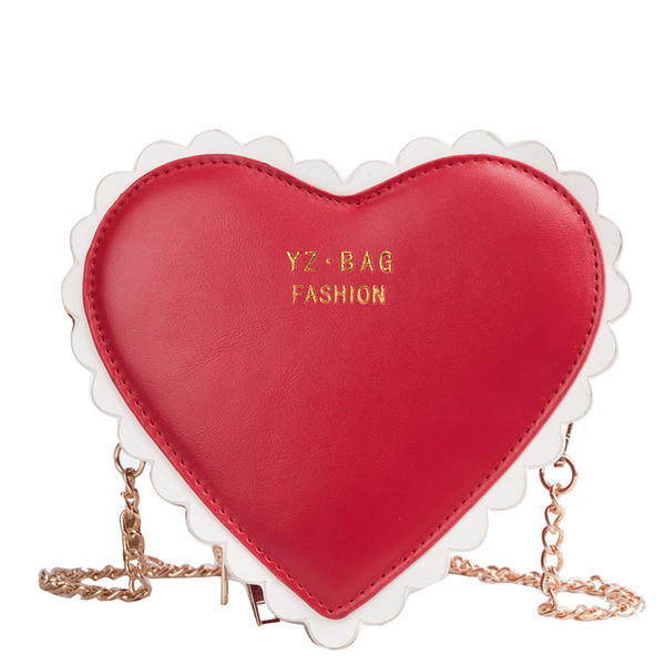 Модерна дамска чанта от еко кожа в три цвята във формата на сърце 