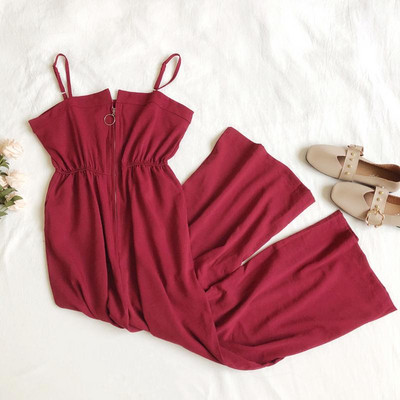 Salopetă casual de damă cu bretele subțiri și închidere din metal