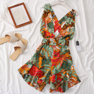 Modern női jumpsuit V-nyakkal és virágmotívummal, négy színben