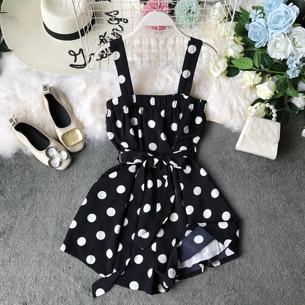 Salopetă de damă modernă cu vâsle în puncte albe și negre