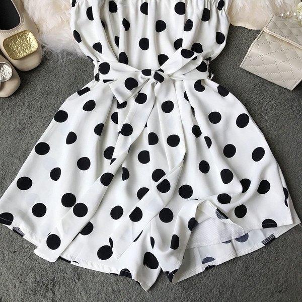 Salopetă de damă modernă cu vâsle în puncte albe și negre