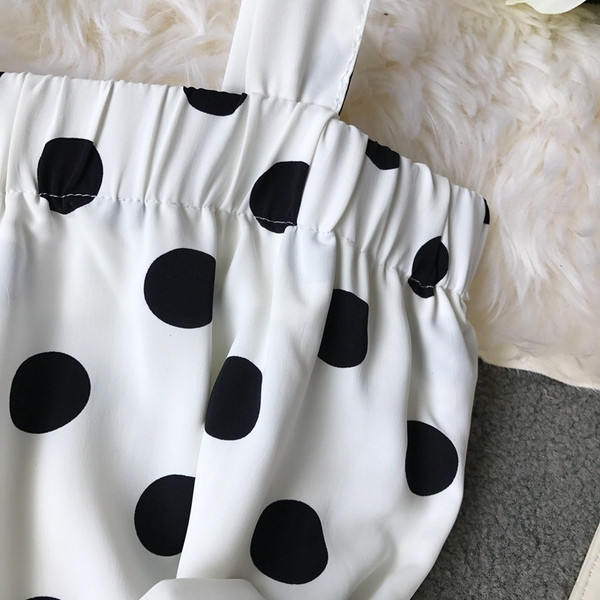 Salopetă de damă modernă cu vâsle în puncte albe și negre