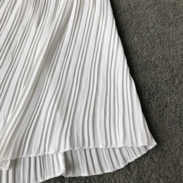 Pantaloni moderni de damă cu talie înaltă în alb și negru