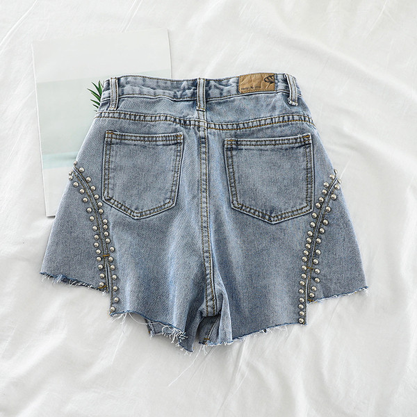 Blugi de dama cu decor metalic