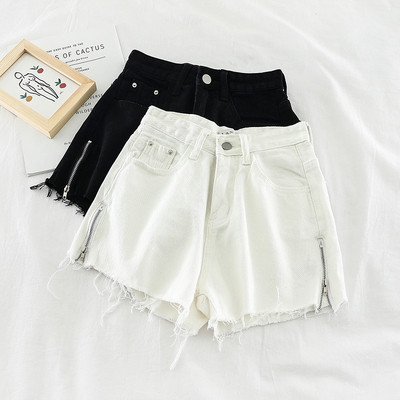 Дамски дънкови панталони в бял и черен цвят и елемент цип