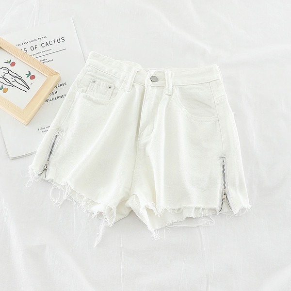 Blugi de dama in alb si negru si element cu fermoar