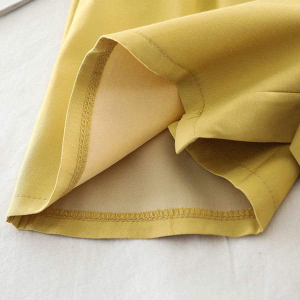 Stílusos női nadrág öv elemmel több színben