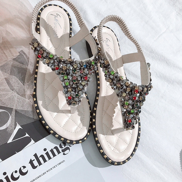 Alkalmi női szandál kövekkel fekete-fehér színben