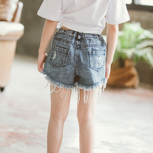 Modern, rövid gyerekfarmer két színben, zsebekkel