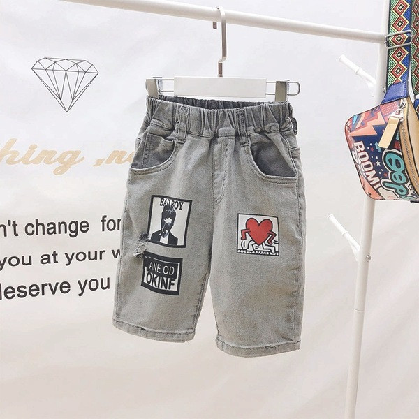 Modern gyerekfarmer fiúknak rátéttel és zsebekkel