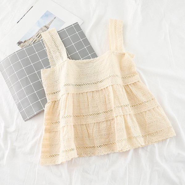 Modern női felső bézs és fehér színben