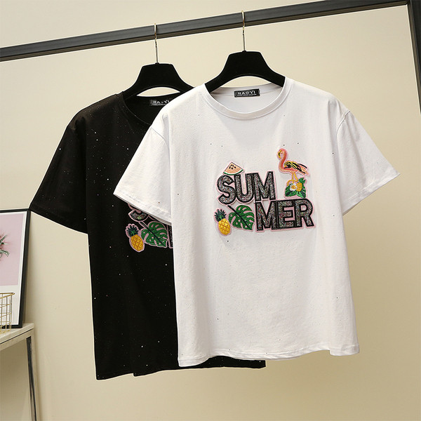 Alkalmi női póló fehér és fekete mintával