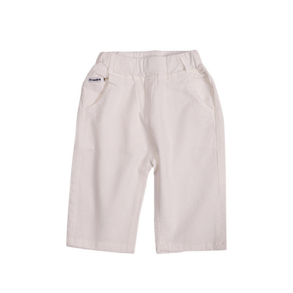 Modern gyereknadrág fiúknak fehér színben, rátéttel