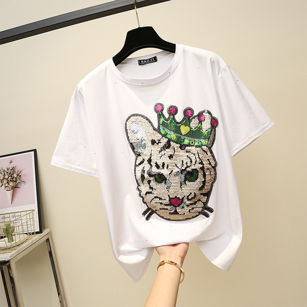 Női póló O-nyakkal, fekete-fehér flitterekkel