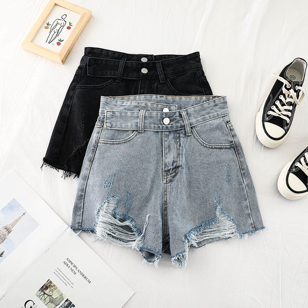 Női nadrág szakadt motívumokkal, két színben