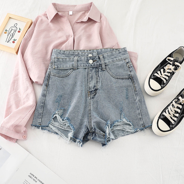 Női nadrág szakadt motívumokkal, két színben