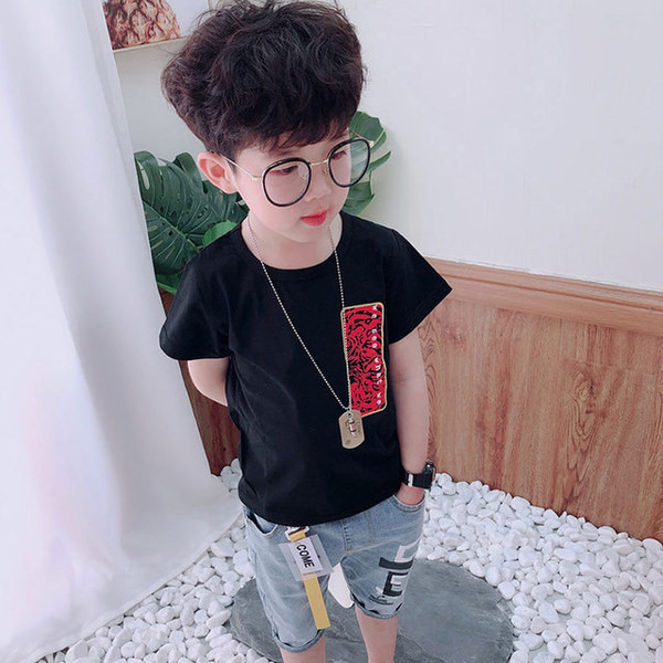 Gyermek póló fiúknak fehér és fekete színben felirattal