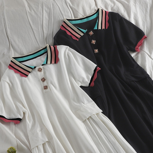 Modern női ruha rövid ujjal és gombokkal fehér és fekete színben