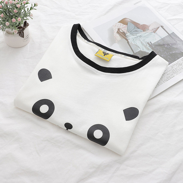 Alkalmi női póló fehér színben, mintával