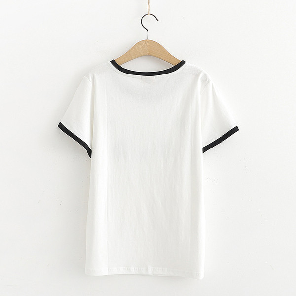 Alkalmi női póló fehér színben, mintával