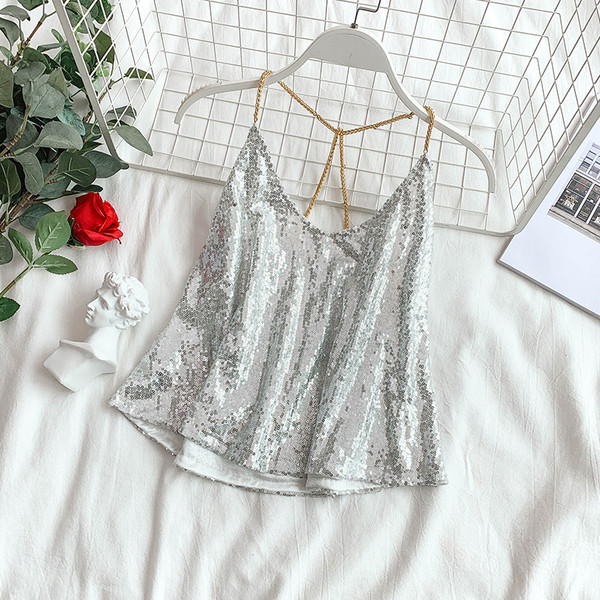 Modern női felső, ezüst és fekete flitterekkel
