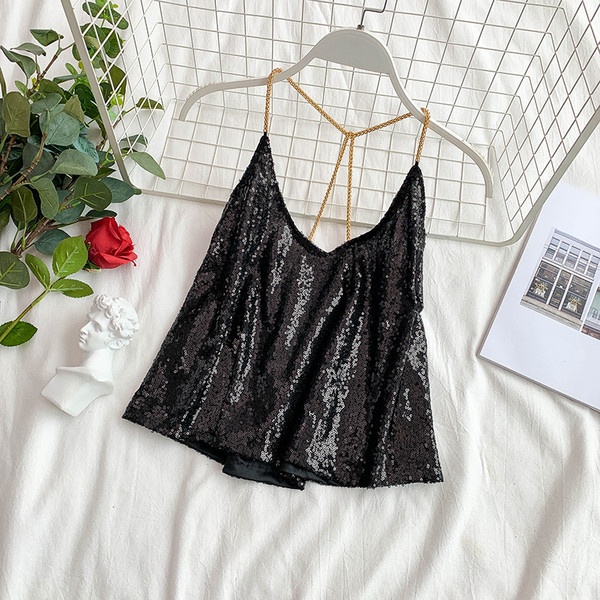 Modern női felső, ezüst és fekete flitterekkel