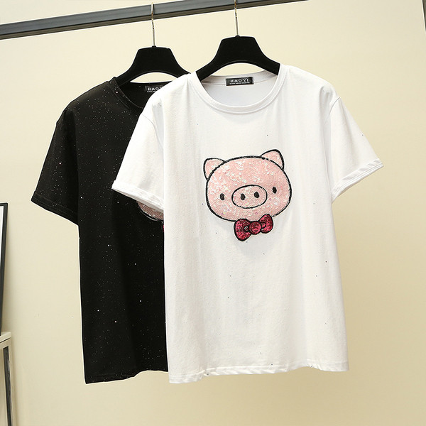 Modern női póló fehér és fekete színben, rátéttel és flitterekkel